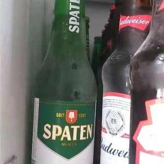 Garrafa de Spaten e Budweiser geladas